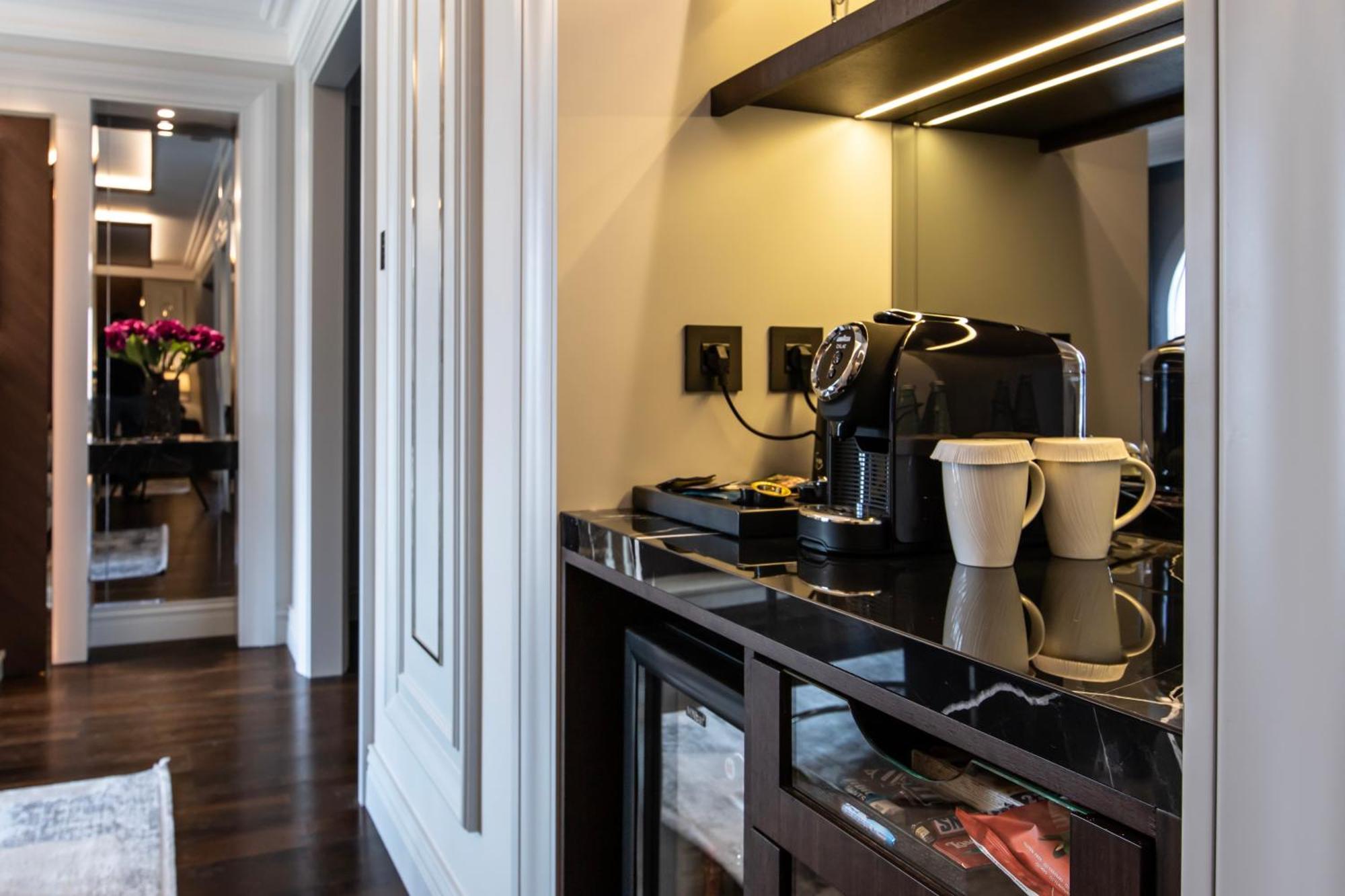 Xheko Imperial Luxury Hotel & Spa Tiranë Luaran gambar A Nespresso machine in a hotel room