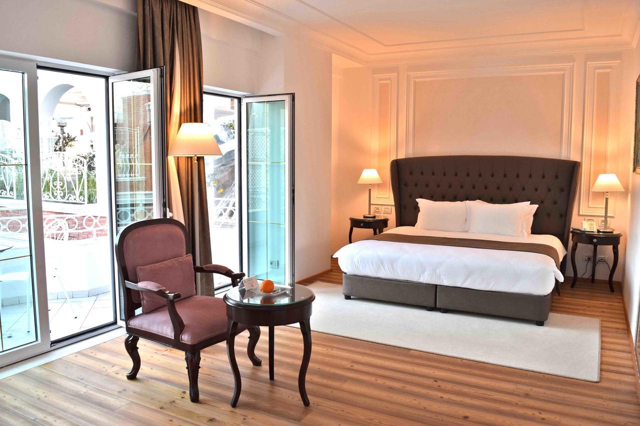 Xheko Imperial Luxury Hotel & Spa Tiranë Luaran gambar A bedroom at the hotel